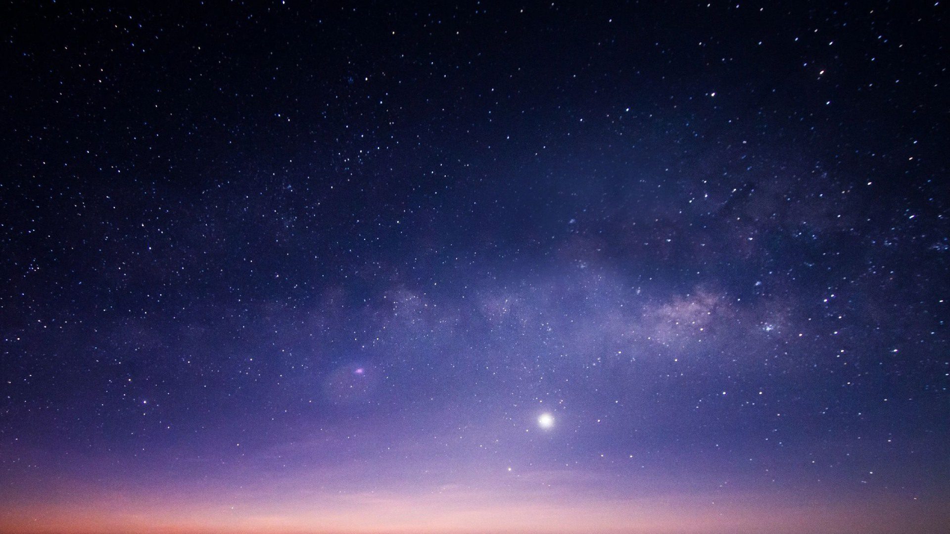 A night sky with stars and the milky way.